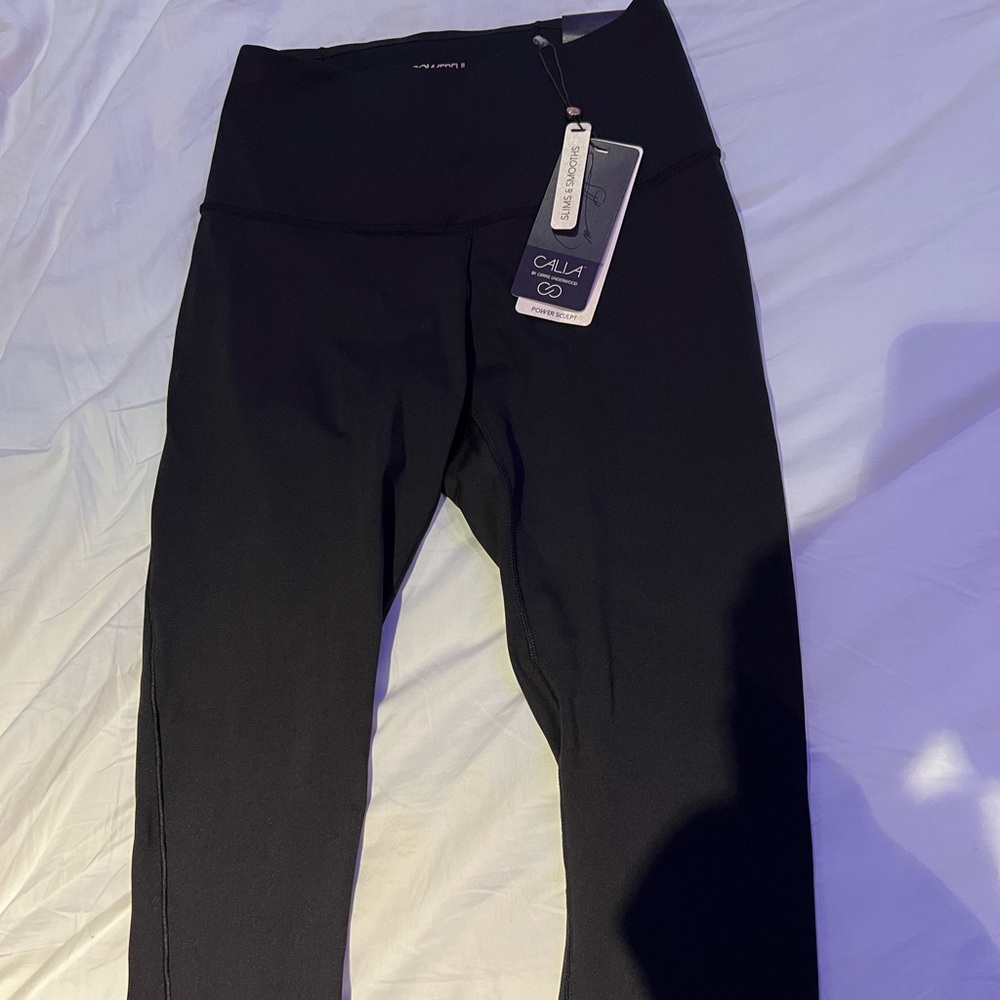 Calia by Carrie Underwood full length, high rise black leggings. Size Medium